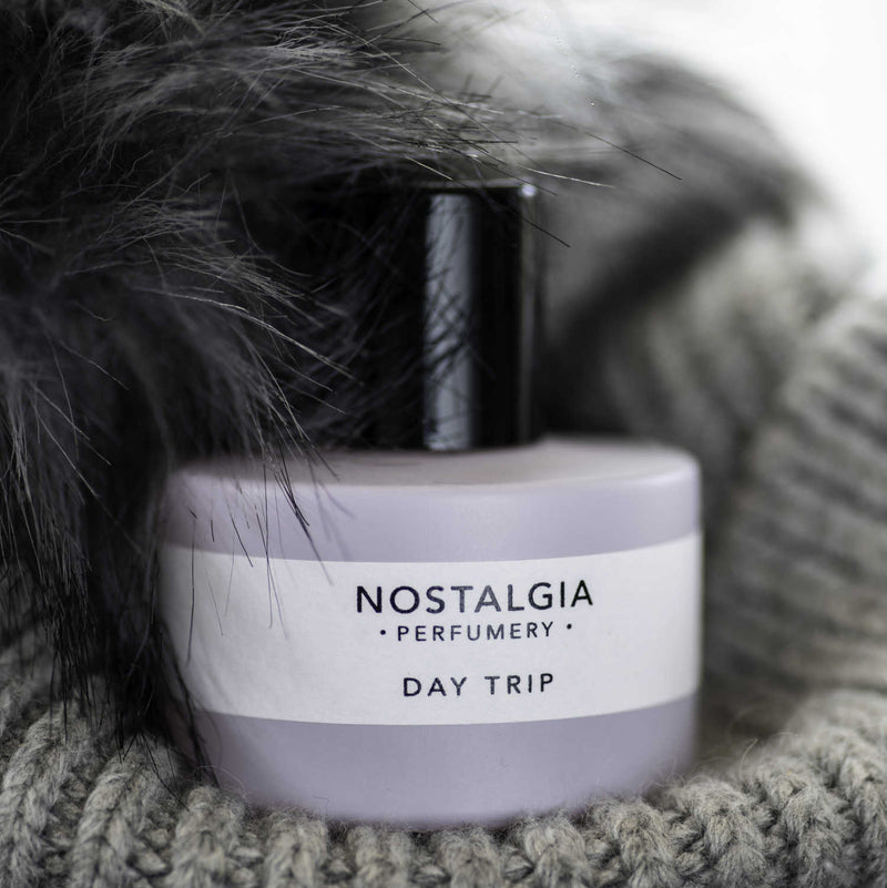 Day Trip perfume with sweater