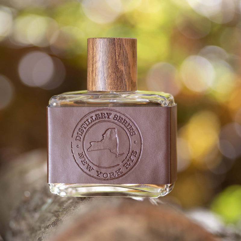 NY RYE Cologne in a leather bottle with wood cap