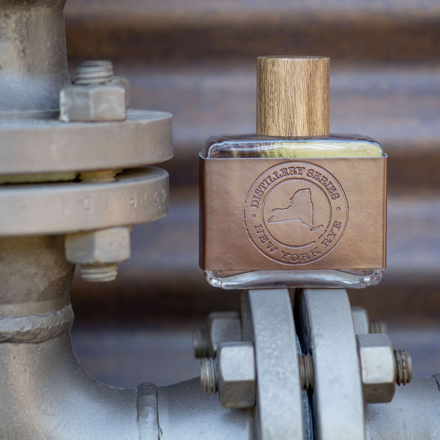 New York Cologne Bottle on a machinery