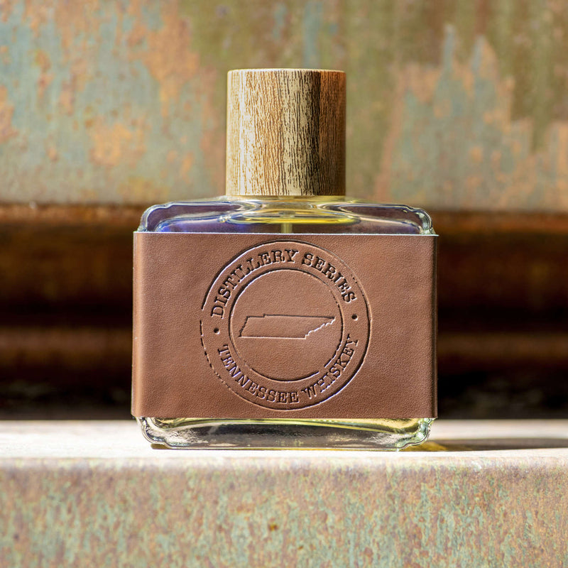 Tennessee Cologne Botle presented with leather cover and wood print cap 