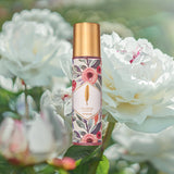ethereal mist white rose flower background green bottle with flowers