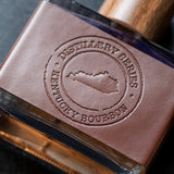 Kentucky bourbon cologne in vegan leather bottle